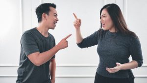 man -woman in a verbal fight