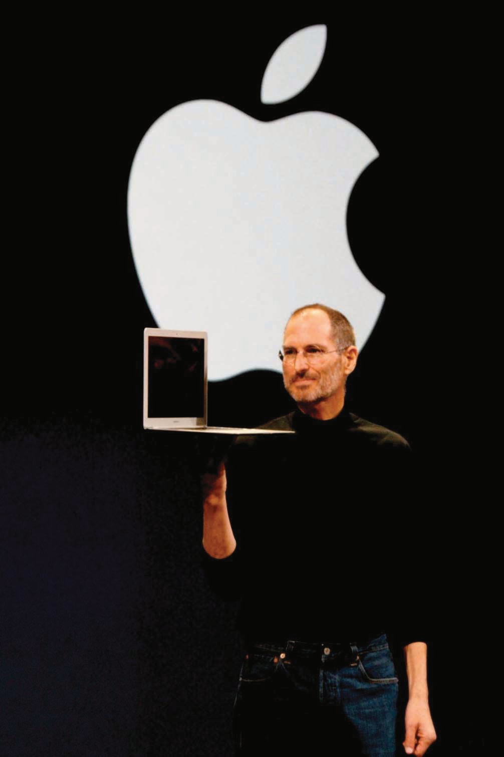 Steve Jobs presenting a new Apple product.